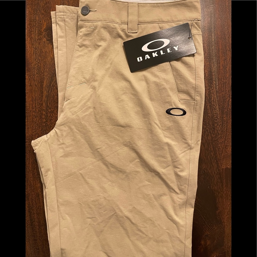 Oakley Mens Khaki Athletic Pants. Black embroidery.